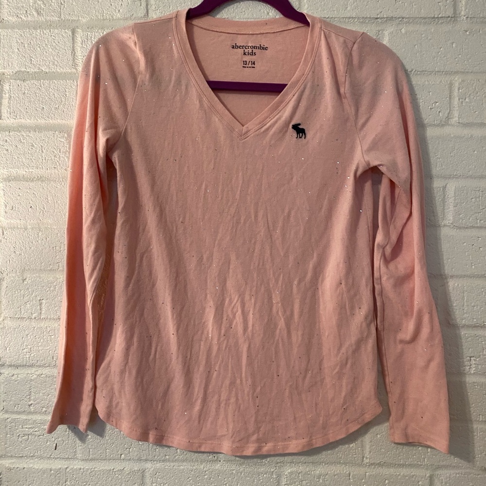 Sparkles!! Cute, long sleeve pink top.